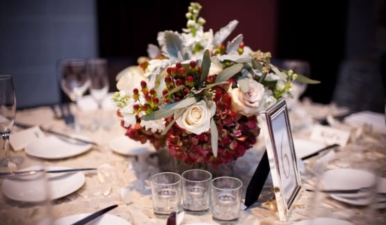 Red and white flowers on a table